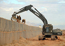 220px-Up-armored_excavator_in_Afghanistan.jpg