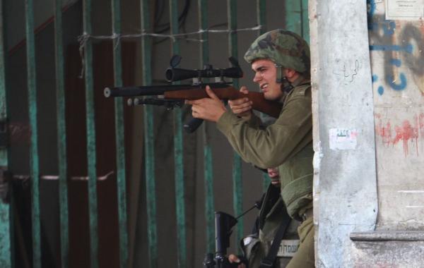 ap-photo-2014-israeli-idf-in-gaza-with-ruger-10-22-1022-10-22-suppressed-with-bx25-mag-516.jpg