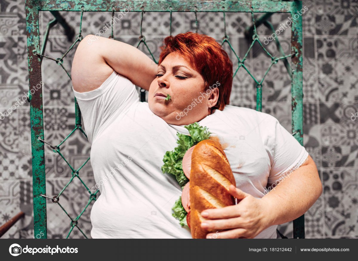 depositphotos_181212442-stock-photo-fat-woman-bed-eating-sandwich.jpg