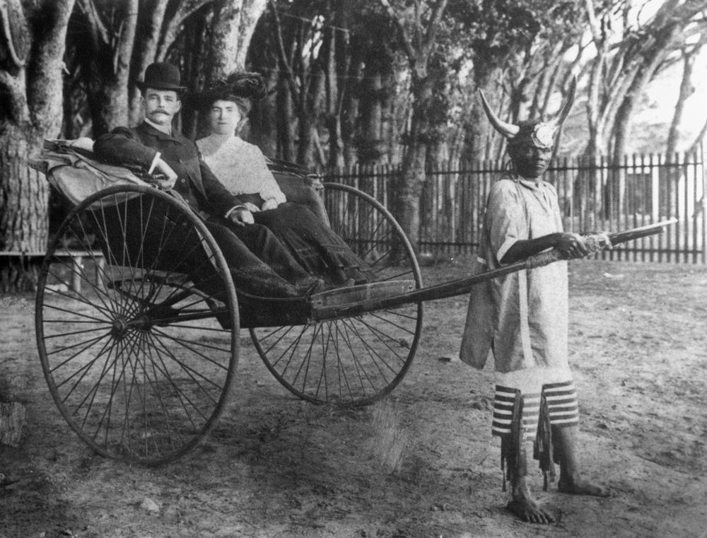 Dick_and_Cissie_Rodgers_in_a_rickshaw,_Cape_Town,_South_Africa,_ca_1905.jpg
