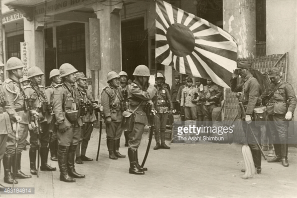 imperial-japanese-army-and-navy-soldiers-salute-after-the-landing-at-picture-id463184814.jpeg
