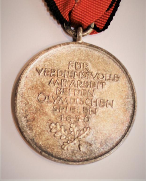 serebrjanaja_medal_za_uchastie_v_rabotakh_olimpiady_1936_g_raritet (1).jpg