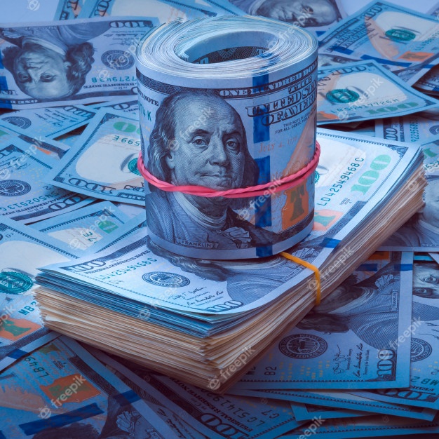 stack-of-dollars-the-roll-of-dollars-on-the-background-of-hundred-dollar-bills_76263-77.jpg