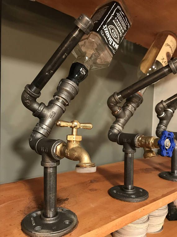 Unique LIQUOR DISPENSER.jpeg