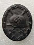 Знак "За ранение 1939" в чёрном+миниатюра знака за ранение.