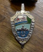 Комплект морского пограничника, знаки (60 лет на страже Каспия и др.), ленты, кокарда.