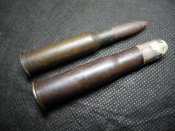 Макеты патронов 7,62х54R с пулей Кутового и 10.75x58R Бердана.
