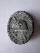 Знак за поранення II ступеню