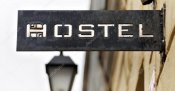 depositphotos_55779051-stock-photo-old-signboard-hostel.jpg