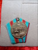 Медаль 12