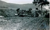 Фото «Немецкий мотоциклист у разбитых грузовиков». Копия. 0473