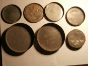7 крышек - баночек .   3 рейх .