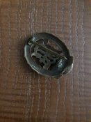 Знак ДРА в бронзе