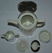 Кофейник,молочник,сахарница, в термокапсусе.