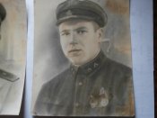 Два больших фото военных с одной семьи .