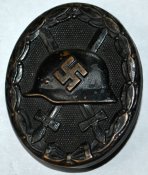Знак "За ранение 1939" в чёрном.