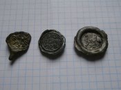 3 пломбы с цинка для патронов 1920 , 1922  и  1923 год .