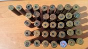 Латуные стреляные гильзы 12 кл. 35 штук и 2 шт 16 кл. всего 37 штук