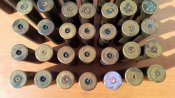 Латуные стреляные гильзы 12 кл. 35 штук и 2 шт 16 кл. всего 37 штук