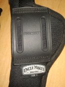 Кобура пистолетная Uncle Mike's + пистолетный ремешок страховочный