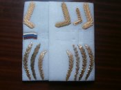 Орнаменты на головные уборы и армейскую форму .