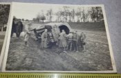 2 фото 88-мм зенитная пушка Flak.18/36/37 и перекинутая машина (трофеи)