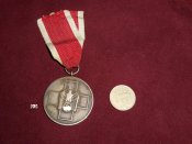 medal_znak_za_zabotu_o_nemeckom_narode_4_stepen_1_maja_1939_god_3_rejkh_germanija_original_1.jpg