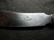 Личные вещи солдата Вермахта (жировница, нож, курительная трубка).
