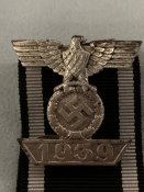 железный крест ||кл. и знак повторного награждения одним лотом