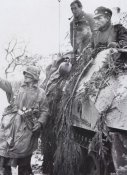 Soldiers from 116th Panzer Division were halted on a road to check position during Battle of the.jpg