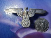 №2 . На фуражку орел SS .