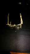 знак на кепе копача