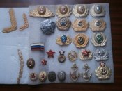 Кокарды , дубки , якоря и звезды СССР , Украины и России .