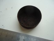 Крышка от немецкой дымовой гранаты.