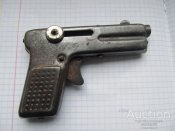 igrushka_sssr_zhestjanoj_pistolet_redkij.jpg