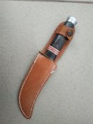 Нож охотничий с наборной рукояткой в кожаных ножнах
