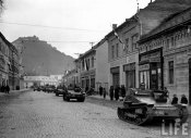 Hungarian tanks rolling through a village.Huszt, Czechoslovakia 1939.jpeg