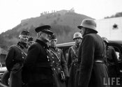 Adm. Nicholas Horthy (fore, L) talking with staff officers.Huszt, Czechoslovakia 1939.jpeg