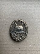 Нагрудный знак «За ранение» в бронзе. Патина