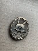 Нагрудный знак «За ранение» в бронзе. Патина