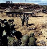 pose for snapshots next to Russian-made PT-76 ank captured on the HCM Trail on the ninth day of .jpg
