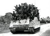 Khmer Rouge cadres riding on the military vehicle.jpg