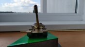 Танк на пьедестале. Сделан из цветного метала при СССР.