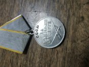 За бойові заслуги
