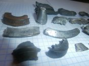 Осколки с надписями с боевых позиций .
