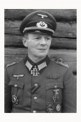 Полковник Герхард Шмидхубер в январе 1944...