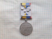 Нагрудний знак «Учасник АТО».Не является гос наградой.