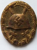 Знак ранение в золоте