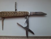 Ножик ,накладки латунь, знак качества.
