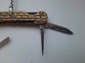 Ножик ,накладки латунь, знак качества.